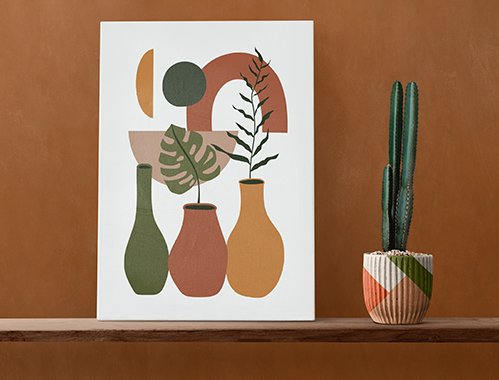 canvas-wall-art-on-a-wooden-shelf-with-cactus-6K6FGXG.jpg